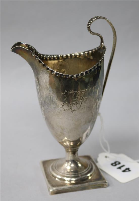 A George III silver helmet cream jug by Hester Bateman, London, 1783, 5.75in.